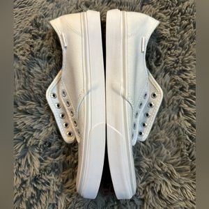 Vans White Canvas Slip-On Sneakers
